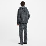 Pantalon droit à Monogram floqué en denim
